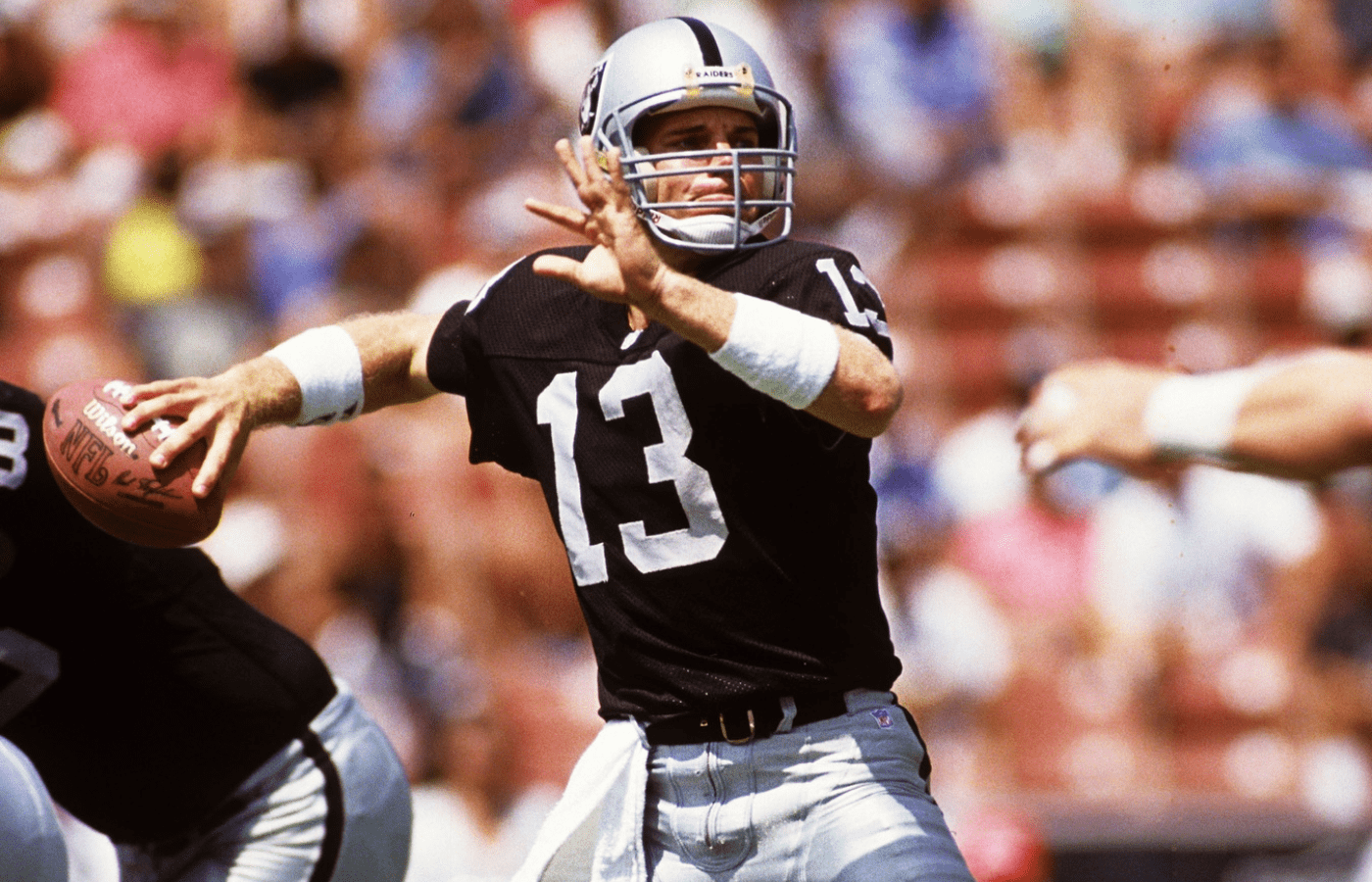 Los Angeles Raiders quarterback Jay Schroeder (13) in action against the Chicago Bears at Los Angeles Memorial Coliseum.