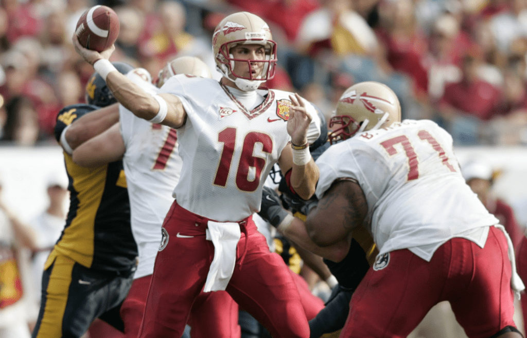 Jan 01, 2005; Jacksonville, FL, USA; Florida State Seminoles quarterback Chris Rix completes a third quarter pass against the West Virginia Mountaineers in the 2005 Toyota Gator Bowl held at Alltel Stadium. FSU defeated West Virginia 30-18. Mandatory Credit: Photo by Imagn Images (©) Copyright 2004 by Preston Mack