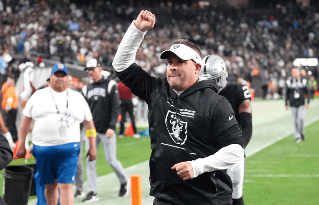 Dec 4, 2022; Paradise, Nevada, USA; Las Vegas Raiders head coach Josh McDaniels celebrates after the Raiders defeated the Los Angeles Chargers 27-20 at Allegiant Stadium. Mandatory Credit: Stephen R. Sylvanie-Imagn Images