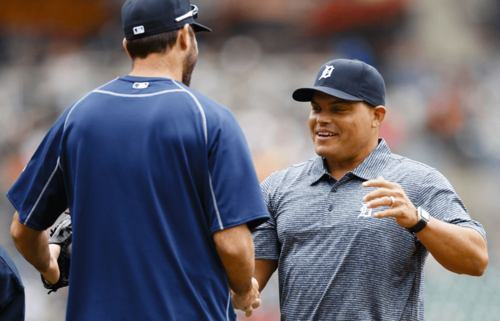 May 7, 2016; Detroit, MI, USA; Former Detroit Tigers Ivan Pudge Rodriguez (R) shakes hands with Detroit Tigers starting pitcher Justin Verlander (35) after he throws out the ceremonial first pitch prior to the Tigers' game against the Texas Rangers at Comerica Park. Mandatory Credit: Rick Osentoski-Imagn Images