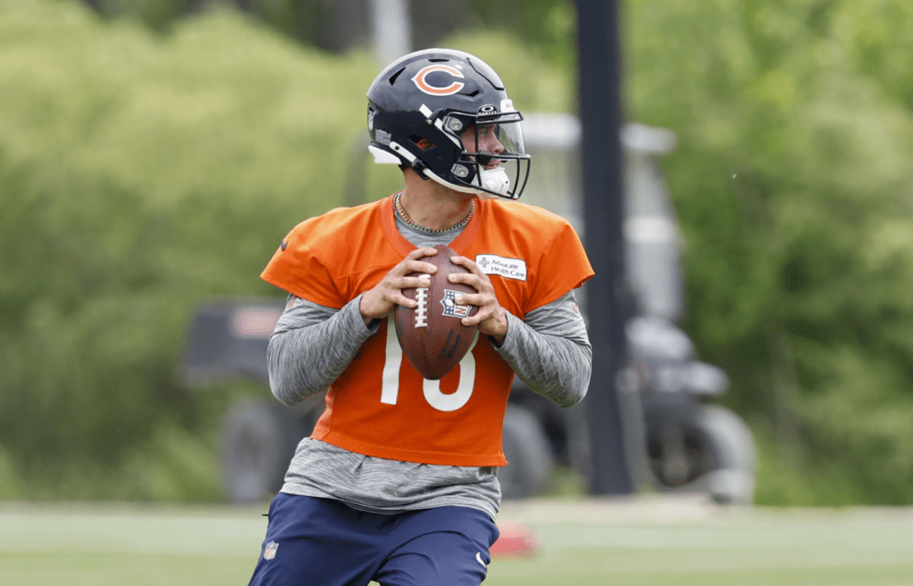 Jun 3, 2025; Lake Forest, IL, USA; Chicago Bears quarterback Caleb Williams (18) looks to pass the ball during minicamp at Halas Hall. Mandatory Credit: Kamil Krzaczynski-Imagn Images
