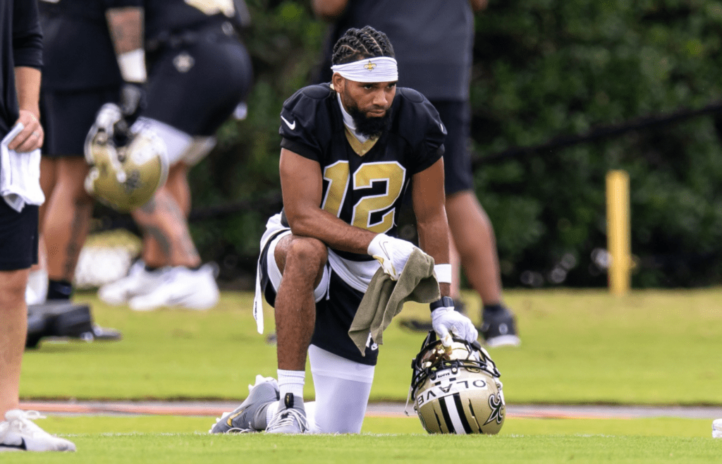 Jun 10, 2025; New Orleans, LA, USA; New Orleans Saints wide receiver Chris Olave (12) looks on during minicamp at Ochsner Sports Performance Center. Mandatory Credit: Stephen Lew-Imagn Images