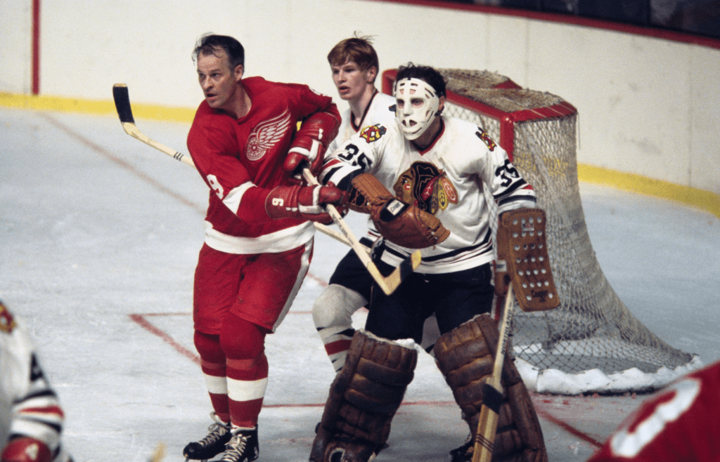 1970; Detroit, MI, USA; FILE PHOTO; Chicago Blackhawks goalie Tony Esposito (35) and defender Keith Magnuson (3) in action against Detroit Red Wings right wing Gordie Howe (9) during the 1970 season. Mandatory Credit: Tony Tomsic-USA TODAY NETWORK