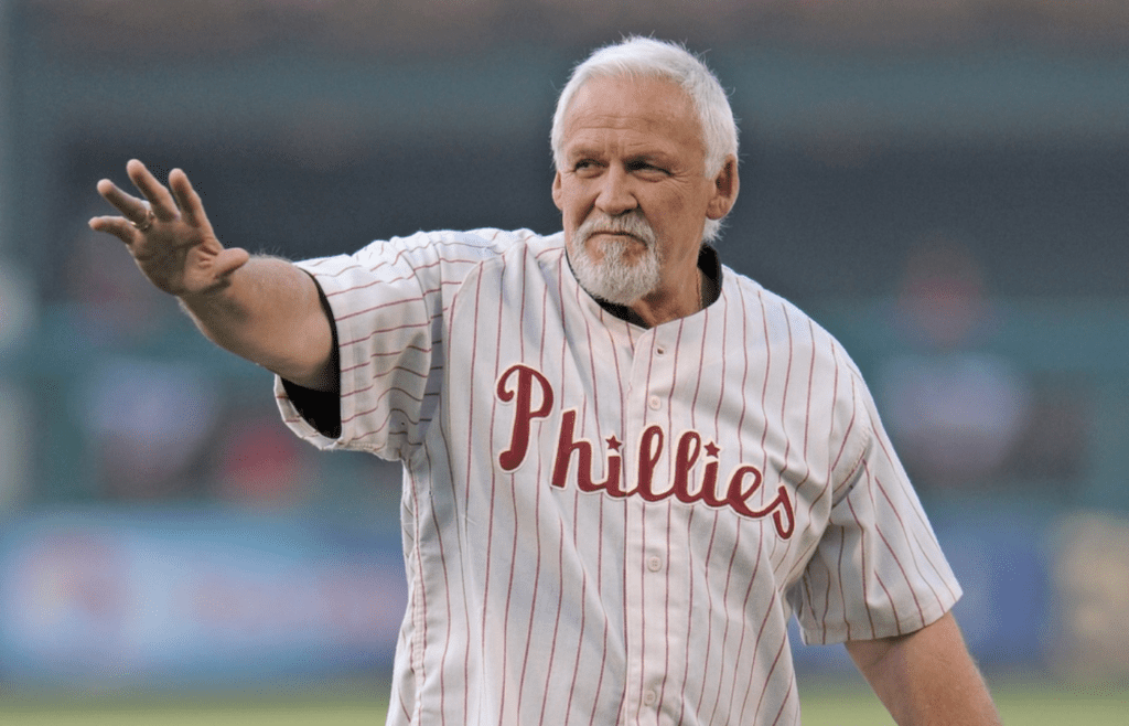 May 18, 2012; Philadelphia, PA USA; Philadelphia Flyers hall of fame goalie Bernie Parent waves to the crowd before throwing out the first pitch before the start of game between the Philadelphia Phillies and the Boston Red Sox at Citizens Bank Park. Mandatory Credit: Eric Hartline-Imagn Images