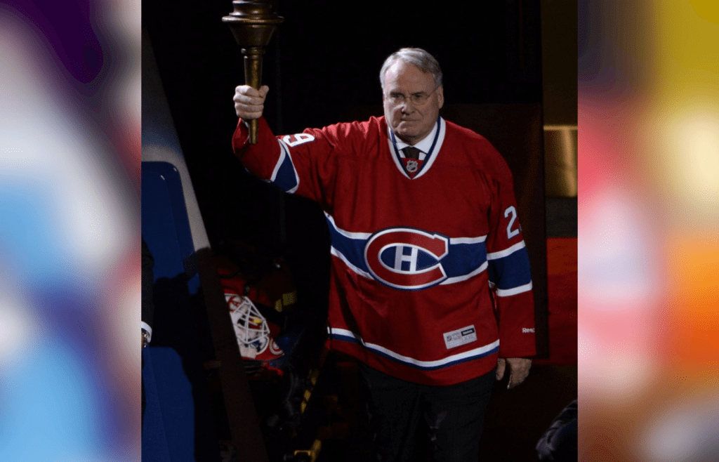 Oct 16, 2014; Montreal, Quebec, CAN; Canadiens former goalie Ken Dryden brings the torch before the game between the Boston Bruins and the Montreal Canadiens at the Bell Centre. Mandatory Credit: Eric Bolte-Imagn Images