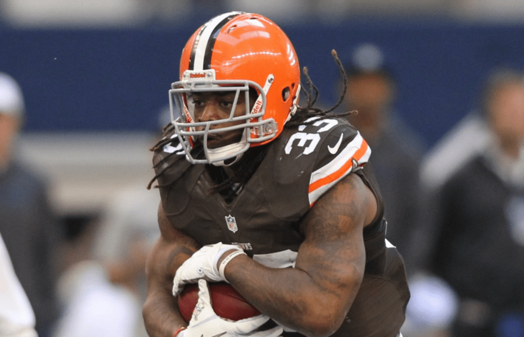 Nov 18, 2012; Arlington, TX, USA; Cleveland Browns running back Trent Richardson (33) runs the ball during the game against the Dallas Cowboys at Cowboys Stadium. The Cowboys beat the Browns 23-20 in overtime. Mandatory Credit: Tim Heitman-Imagn Images