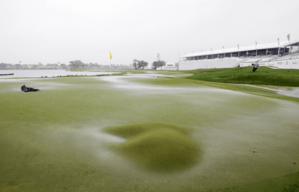 Feb 27, 2015; Palm Beach Gardens, FL, USA; A view of a bulge on the 18th green during a thunder storm that suspended play during the third round of the Honda Classic at PGA National GC Champion Course. Mandatory Credit: Peter Casey-Imagn Images