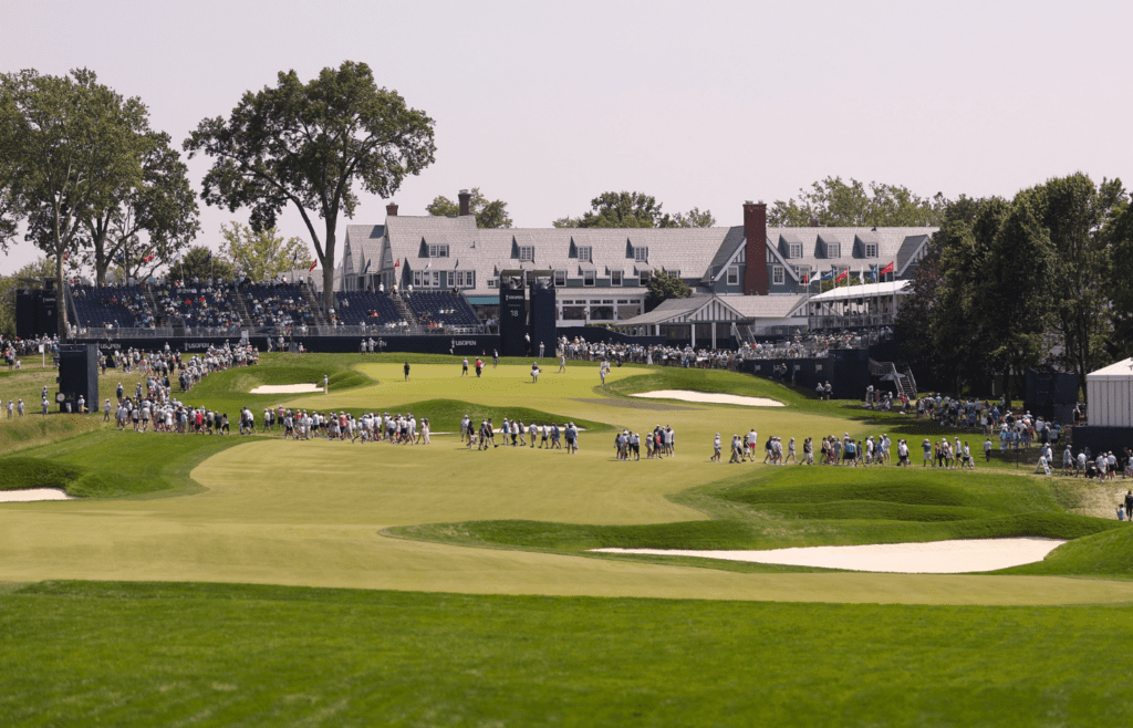 Jun 11, 2025; Oakmont, Pennsylvania, USA; General view of the on the 18th green in front of the clubhouse during a practice round for the U.S. Open golf tournament at Oakmont Country Club. Mandatory Credit: Bill Streicher-Imagn Images