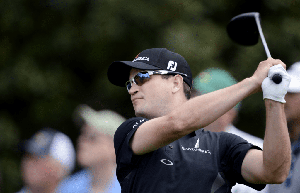 Apr 11, 2013; Augusta, GA, USA; Zach Johnson hits his tee shot on the 18th hole during the first round of the 2013 The Masters golf tournament at Augusta National Golf Club. Mandatory Credit: Jack Gruber-Imagn Images