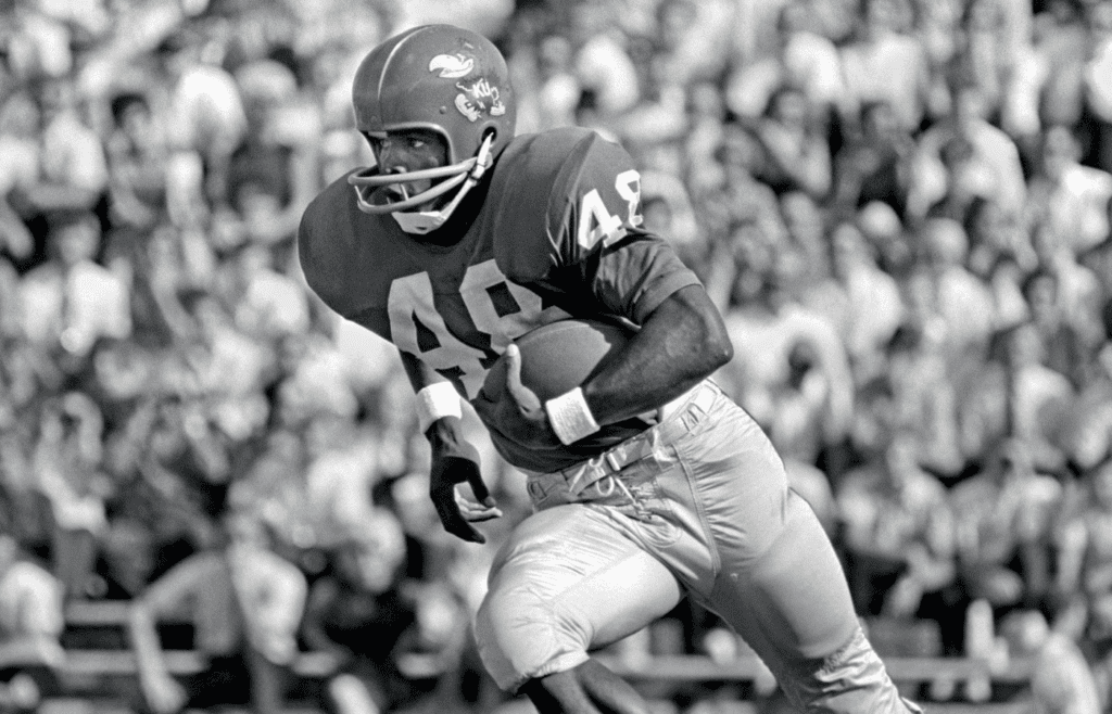 All-American Gale Sayers was known as the \"Kansas Comet.\" 054 Clarkson Sayers