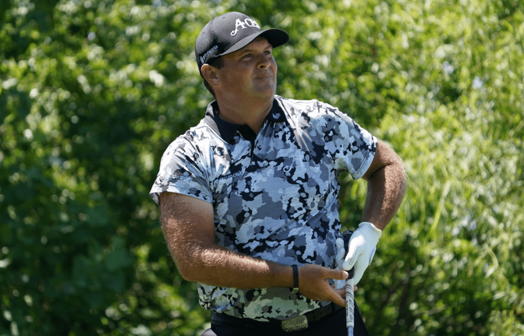 Jun 28, 2025; Carrollton, Texas, USA; Patrick Reed watches his shot from the second tee during the second round of the LIV Golf Dallas golf tournament at Maridoe Golf Club. Mandatory Credit: Raymond Carlin III-Imagn Images