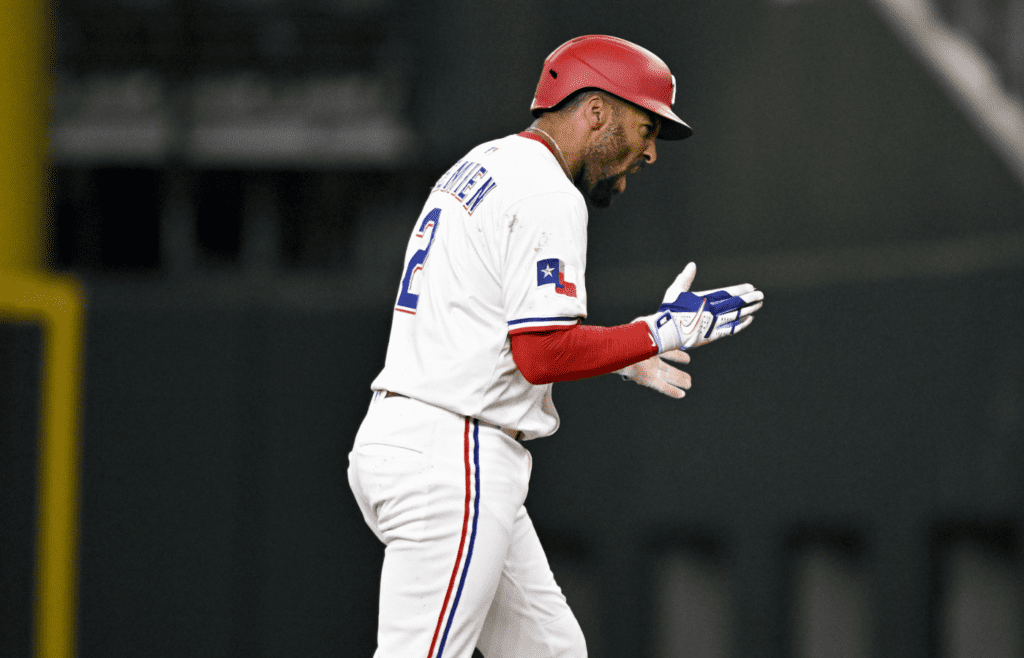 Jun 28, 2025; Arlington, Texas, USA; The Texas Rangers celebrate after second baseman Marcus Semien (2) hits a walk off single for the win over the Seattle Mariners during the tenth inning at Globe Life Field. Mandatory Credit: Jerome Miron-Imagn Images
