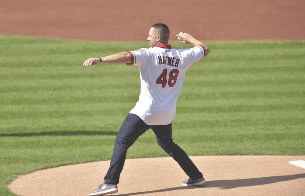 Oct 8, 2018; Cleveland, OH, USA; Former Cleveland Indians Travis Hafner throws out the first pitch during game three of the 2018 ALDS playoff baseball series at Progressive Field. Mandatory Credit: David Richard-Imagn Images
