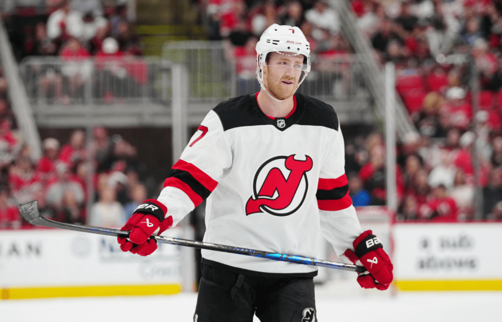Apr 20, 2025; Raleigh, North Carolina, USA; New Jersey Devils defenseman Dougie Hamilton (7) looks on against the Carolina Hurricanes during the third period of game one of the first round of the 2025 Stanley Cup Playoffs at Lenovo Center. Mandatory Credit: James Guillory-Imagn Images