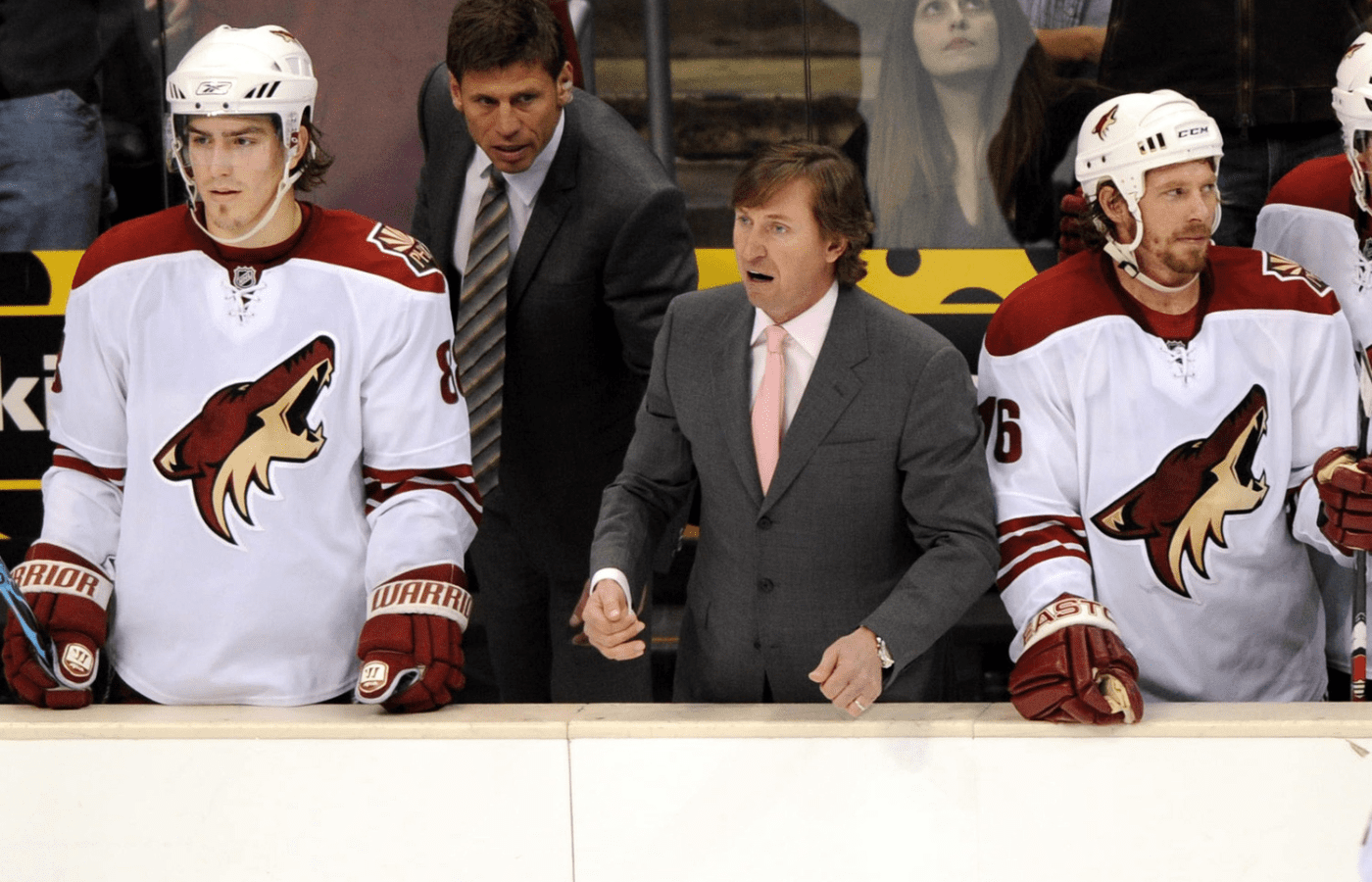 Feb 18, 2008; Los Angeles, CA, USA; Phoenix Coyotes coach Wayne Gretzky, center, with center Peter Mueller (88), left, associate coach Ulf Samuelsson and left wing Mike York (16), right, in the third period of 4-0 victory over the Los Angeles Kings at the Staples Center. It was the 100th career coaching victory for Gretzky. Mandatory Credit: Kirby Lee/Image of Sport-Imagn Images