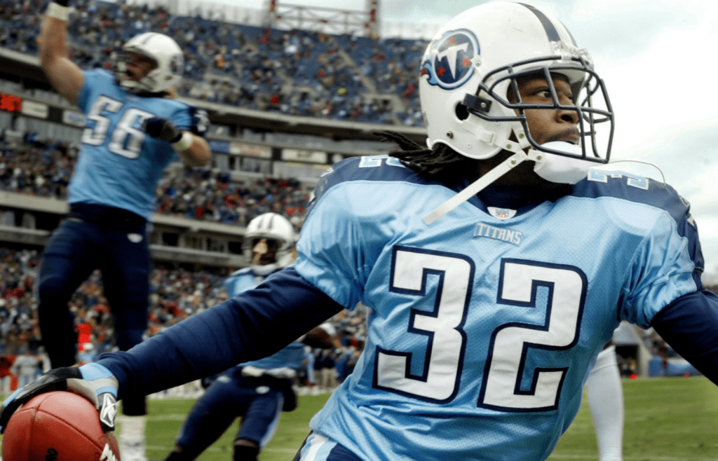 Pacman Jones (32), the Titans' first-round draft pick in 2005, celebrates his 52-yard punt return for a touchdown against the Houston Texans at the Adelphia Coliseum Dec. 11, 2005.