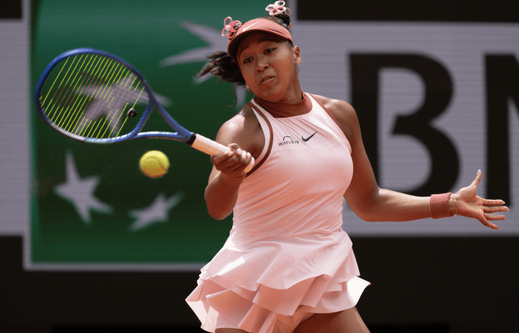 May 26, 2025; Paris, FR; Naomi Osaka of Japan returns a shot during her match against Paula Badosa of Spain on day two at Roland Garros Stadium. Mandatory Credit: Susan Mullane-Imagn Images