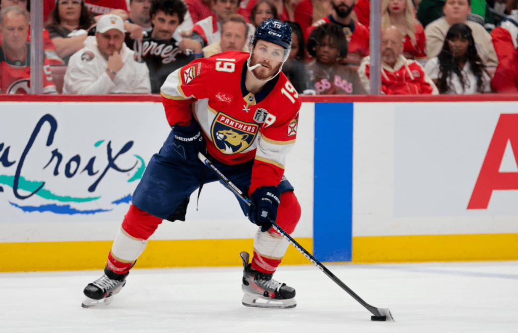 Jun 17, 2025; Sunrise, Florida, USA; Florida Panthers left wing Matthew Tkachuk (19) controls the puck against the Edmonton Oilers during the second period in game six of the 2025 Stanley Cup Final at Amerant Bank Arena. Mandatory Credit: Sam Navarro-Imagn Images