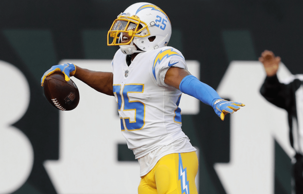 Dec 5, 2021; Cincinnati, Ohio, USA; Los Angeles Chargers cornerback Chris Harris (25) celebrates after an interception during the second half against the Cincinnati Bengals at Paul Brown Stadium. Mandatory Credit: Joseph Maiorana-Imagn Images