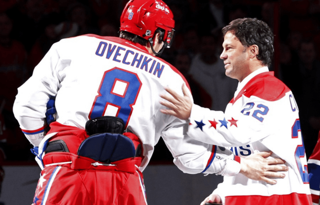February 1, 2011; Washington, DC, USA; Washington Capitals left wing Alex Ovechkin (8) shakes hands at center ice with former Capitals player and NHL Hall of Famer Dino Ciccarelli (R) prior to the Capitals game against the Montreal Canadiens at Verizon Center. The Canadiens won 3-2 in a shootout. Mandatory Credit: Geoff Burke-Imagn Images