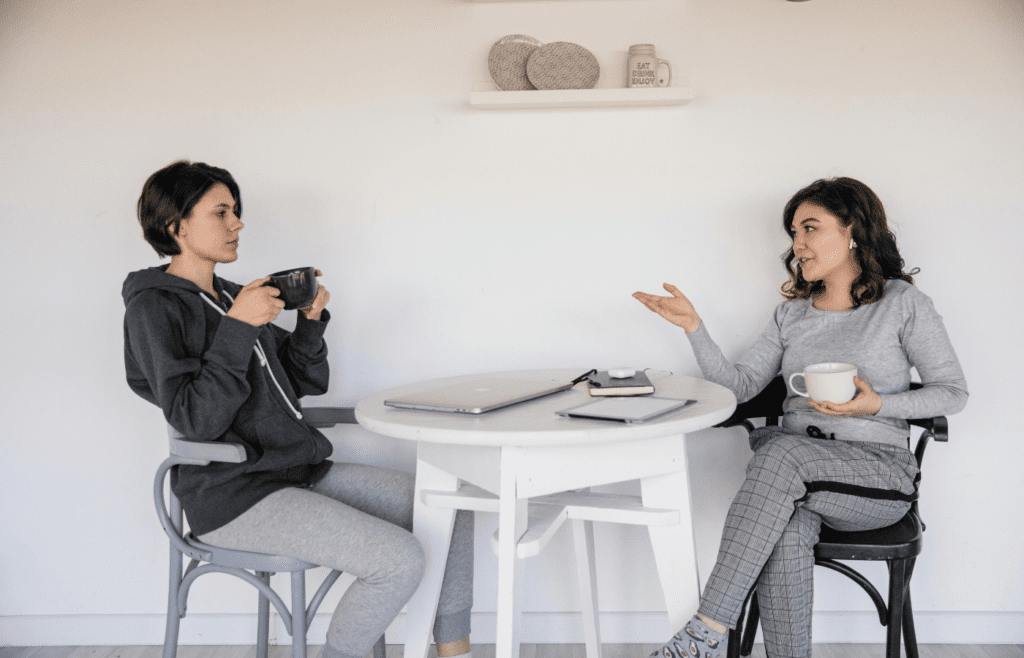 Women sharing frustrations over busy work life