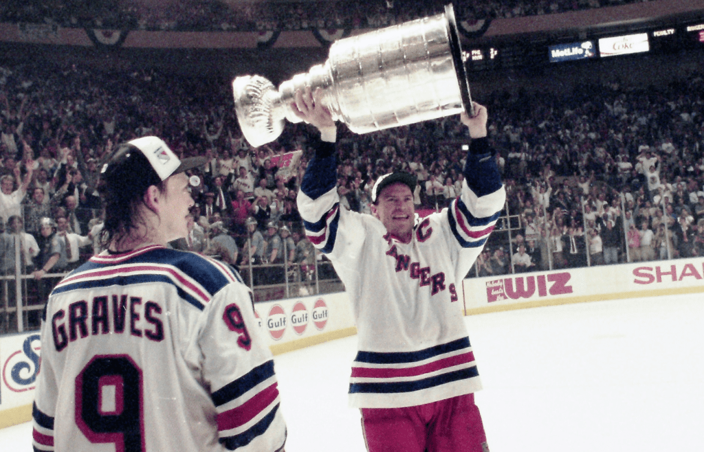 Rangers Mark Messier (11) celebrates with the Stanley Cup after the Rangers defeated Vancouver 3-2 in game 7 of the Stanley Cup finals at Madison Square Garden June 14, 1994. Rangers Win Stanley Cup