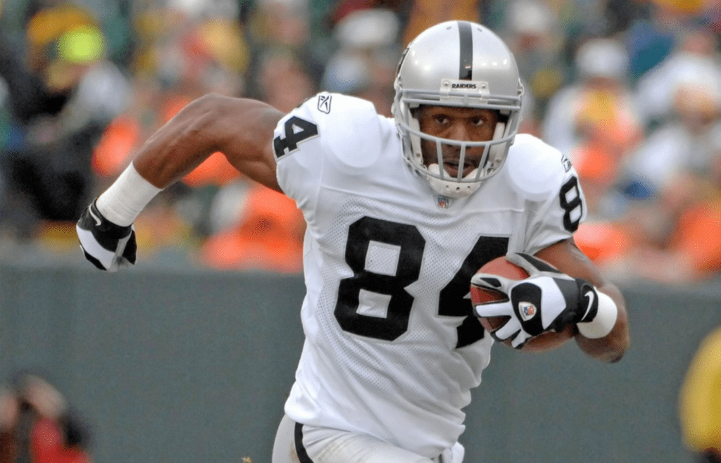 Dec 9, 2007; Green Bay, WI, USA; Oakland Raiders receiver Jerry Porter (84) during 38-7 loss to the Green Bay Packers at Lambeau Field. Mandatory Credit: Kirby Lee/Image of Sport-Imagn Images