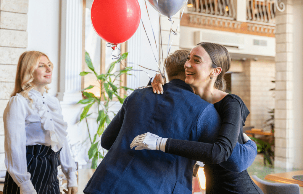 Woman hugging her Friend in a Party
