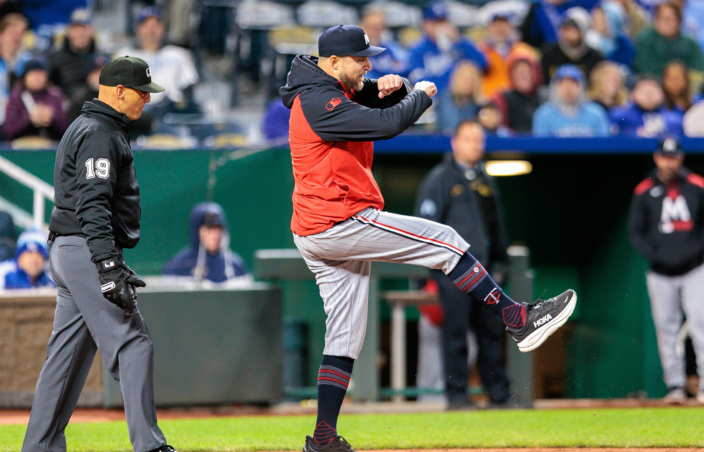 Apr 7, 2025; Kansas City, Missouri, USA; Minnesota Twins manager Rocco Baldelli kicks dirt on home plate after being ejected during the sixth inning against the Kansas City Royals at Kauffman Stadium. Mandatory Credit: William Purnell-Imagn Images