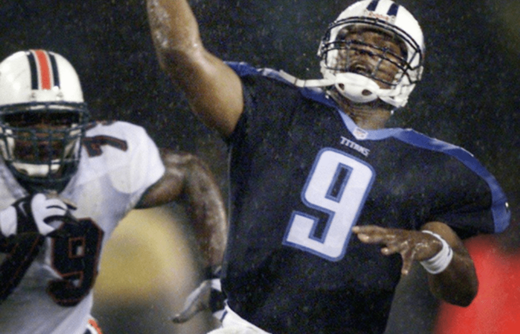 Tennessee Titans quarterback Steve McNair sets to throw a pass against the Miami Dolphins at Adelphia Coliseum on Sept. 9, 2001. The Titans lost their home and season opener 31-23.
