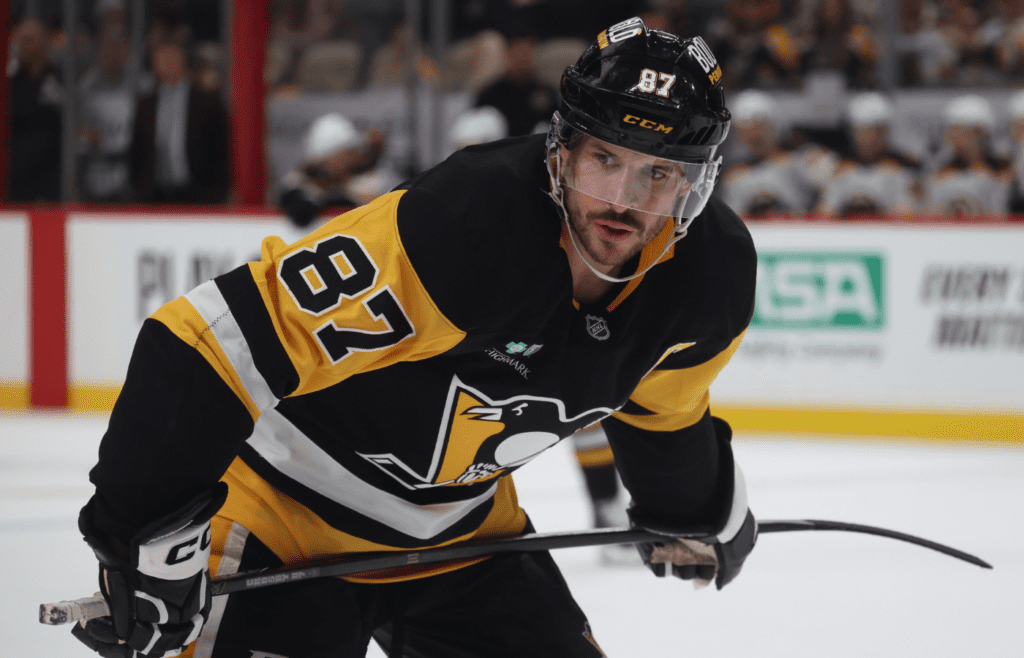 Apr 13, 2025; Pittsburgh, Pennsylvania, USA; Pittsburgh Penguins center Sidney Crosby (87) looks on before a face-off against the Boston Bruins during the third period at PPG Paints Arena. Mandatory Credit: Charles LeClaire-Imagn Images
