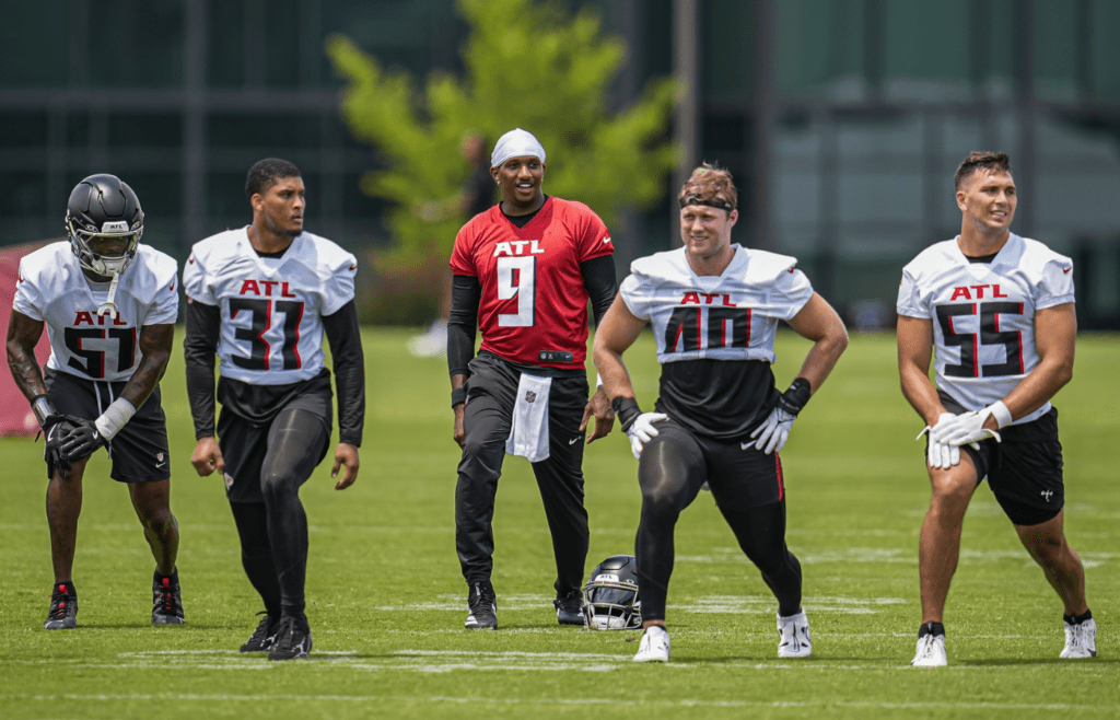 Jun 11, 2025; Atlanta, GA, USA; Atlanta Falcons quarterback Michael Penix Jr. (9) warms up with teammates during Minicamp at Children's Healthcare of Atlanta Training Ground. Mandatory Credit: Dale Zanine-Imagn Images