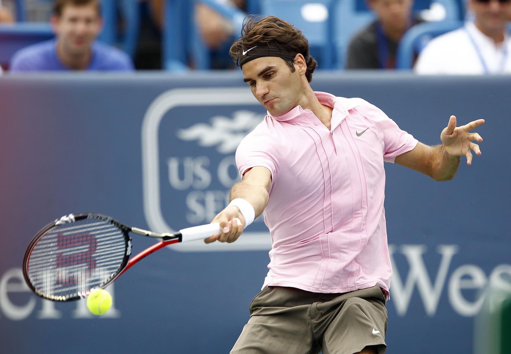 Aug 22, 2010; Mason, OH, USA; Roger Federer (SUI) returns a shot against Mardy Fish (USA) in the final round at the Western and Southern Financial Group Masters at Lindner Family Tennis Center. Federer defeated Fish 7-6 7-6 6-4. Mandatory Credit: Frank Victores-USA TODAY Sports