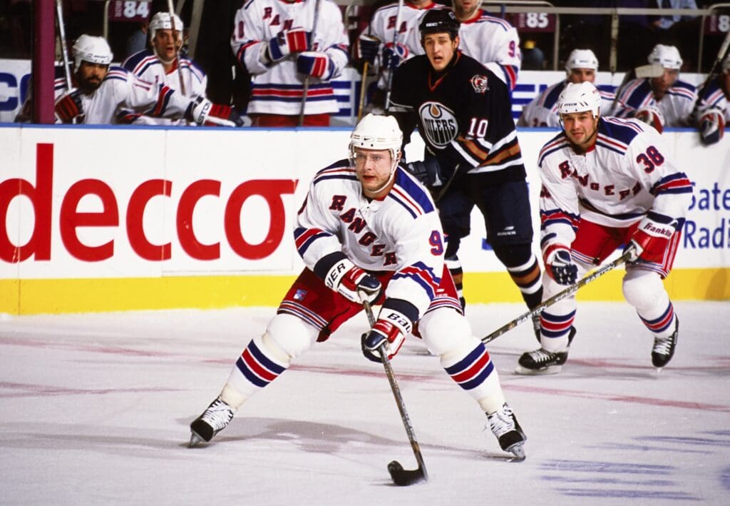 Nov 5, 2002; New York, NY, USA; FILE PHOTO; New York Rangers right wing Pavel Bure (9) and Ronald Petrovicky (38) in action against Edmonton Oilers left wing Shawn Horcoff (10) at Madison Square Garden. Mandatory Credit: Lou Capozzola-USA TODAY NETWORK