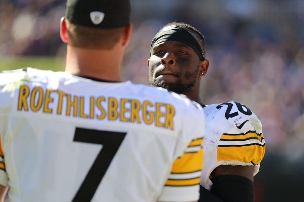 Oct 1, 2017; Baltimore, MD, USA; Pittsburgh Steelers running back LeVeon Bell (26) talks with quarterback Ben Roethlisberger (7) on the sideline during the game against the Baltimore Ravens at M&T Bank Stadium. Mandatory Credit: Mitch Stringer-USA TODAY Sports
