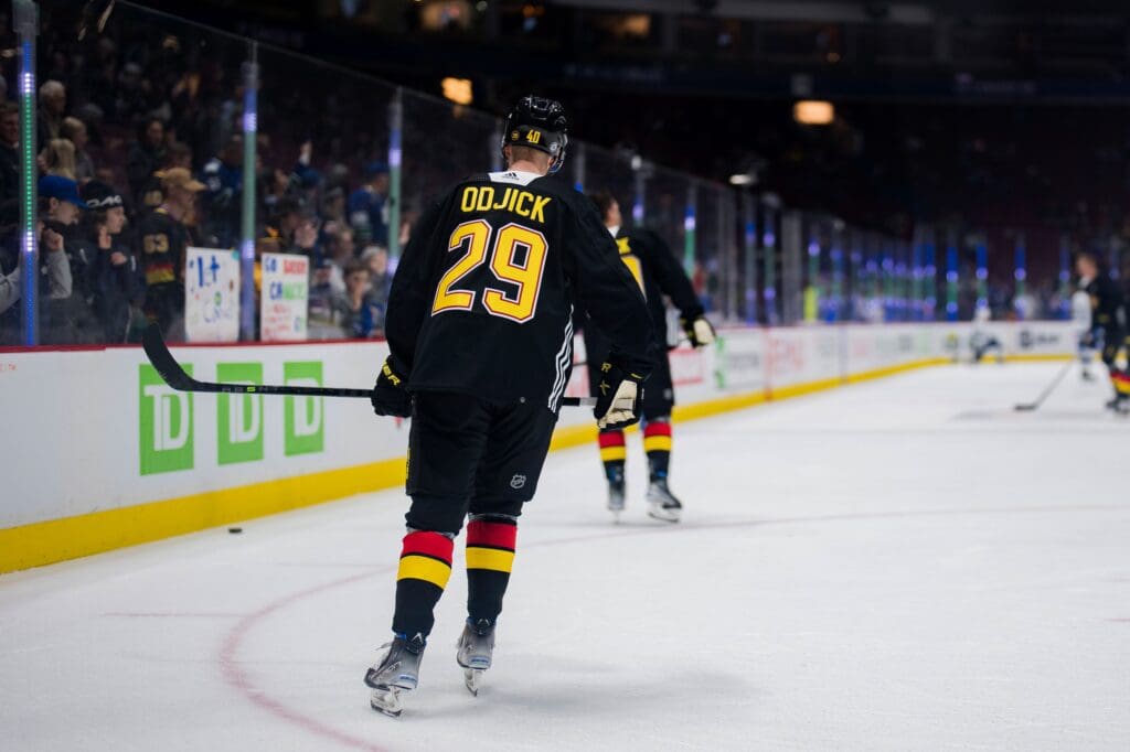 Jan 18, 2023; Vancouver, British Columbia, CAN; Vancouver Canucks forward Elias Pettersson (40) skates during warm up prior to a game against the Tampa Bay Lightning at Rogers Arena. Pettersson is wearing number 29 along with his teammates to celebrate and honour the life of Gino Odjick. Loved by the local fans the former Canucks player passed away on Sunday. The Vancouver players are also wearing commemorative number badges on their helmets in remembrance of Gino. Tampa won 5-2. Mandatory Credit: Bob Frid-USA TODAY Sports