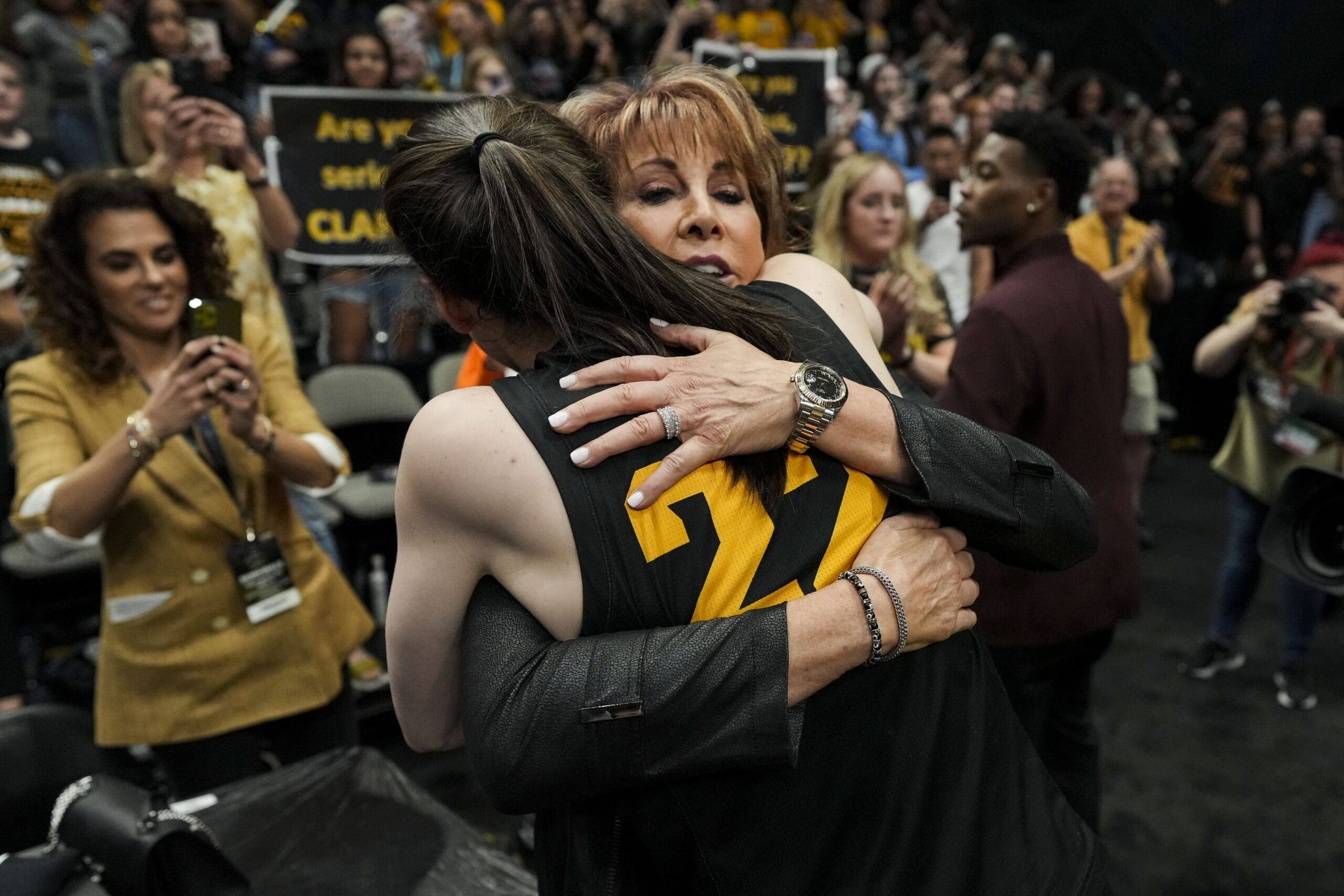 Mar 31, 2023; Dallas, TX, USA; Nancy Lieberman, back, hugs Iowa Hawkeyes guard Caitlin Clark (22) after the game against the South Carolina Gamecocks in semifinals of the women's Final Four of the 2023 NCAA Tournament at American Airlines Center. Mandatory Credit: Kirby Lee-USA TODAY Sports