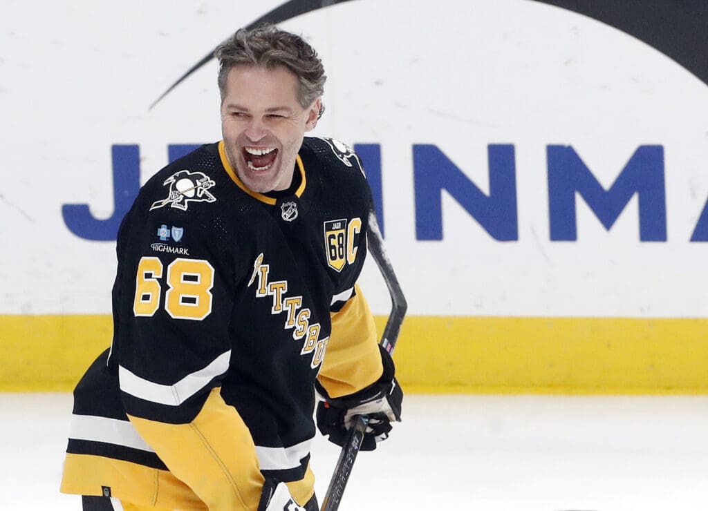 Feb 18, 2024; Pittsburgh, Pennsylvania, USA; Pittsburgh Penguins former right wing Jaromir Jagr (68) reacts during warm-ups against the Los Angeles Kings at PPG Paints Arena. The Kings won 2-1. Mandatory Credit: Charles LeClaire-USA TODAY Sports