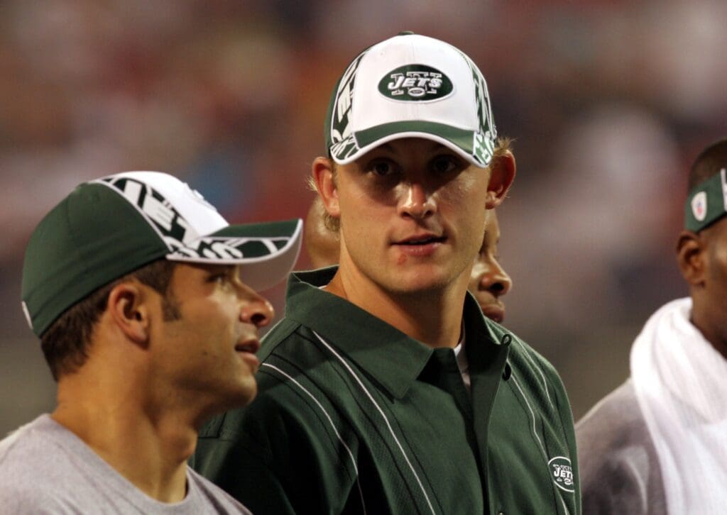 Jets quarterback Chad Pennington walks off the field after the first half with Wayne Chrebet, during game against the Lions at the Meadowlands Aug. 13, 2005.