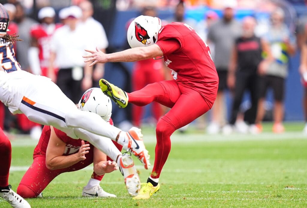 Aug 25, 2024; Denver, Colorado, USA; Arizona Cardinals kicker Matt Prater (5) kicks a field goal in the second quarter against the Denver Broncos at Empower Field at Mile High. Mandatory Credit: Ron Chenoy-Imagn Images