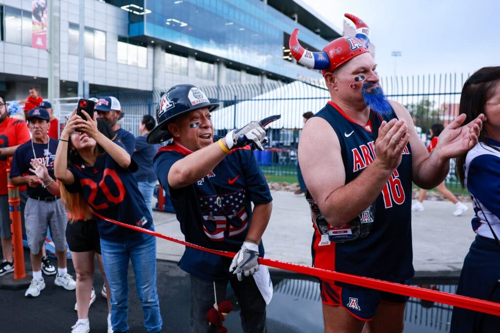 Aug 31, 2024; Tucson, Arizona, USA; Arizona Wildcats fans line up to watch the Wildcat Walk before the game at Arizona Stadium.