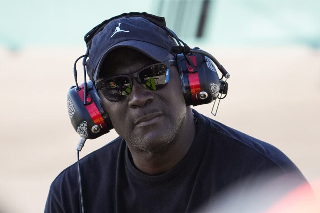Oct 27, 2024; Homestead, Florida, USA; 23XI team owner Michael Jordan watches during the Straight Talk Wireless 400 at Homestead-Miami Speedway. Mandatory Credit: Jasen Vinlove-Imagn Images