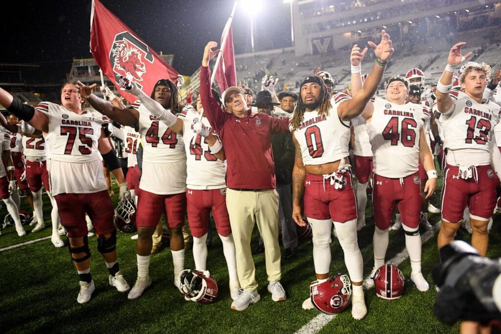 Nov 9, 2024; Nashville, Tennessee, USA; South Carolina Gamecocks head coach Shane Beamer and his team celebrate the win with their fans against the Vanderbilt Commodores during the second half at FirstBank Stadium.