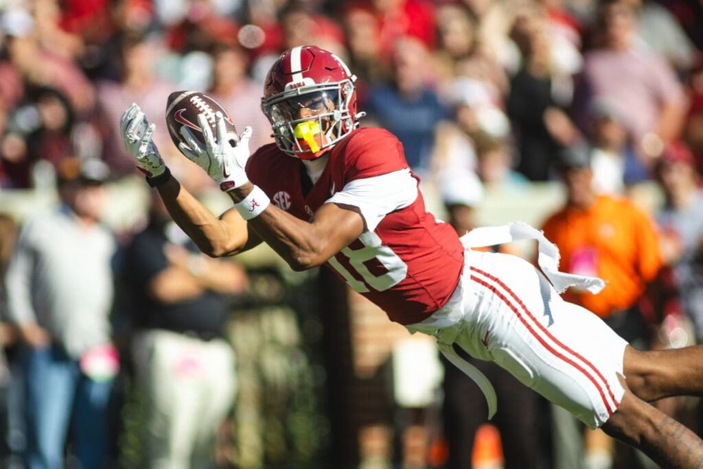 Nov 16, 2024; Tuscaloosa, Alabama, USA; Alabama Crimson Tide wide receiver Caleb Odom (18) dives in an attempt to complete a pass agains the Mercer Bears during the first quarter at Bryant-Denny Stadium. Mandatory Credit: Will McLelland-Imagn Images