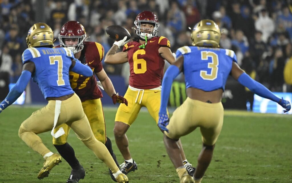 Nov 23, 2024; Pasadena, California, USA; USC Trojans wide receiver Makai Lemon (6) throws a pass during the fourth quarter against the UCLA Bruins at Rose Bowl. Mandatory Credit: Robert Hanashiro-Imagn Images