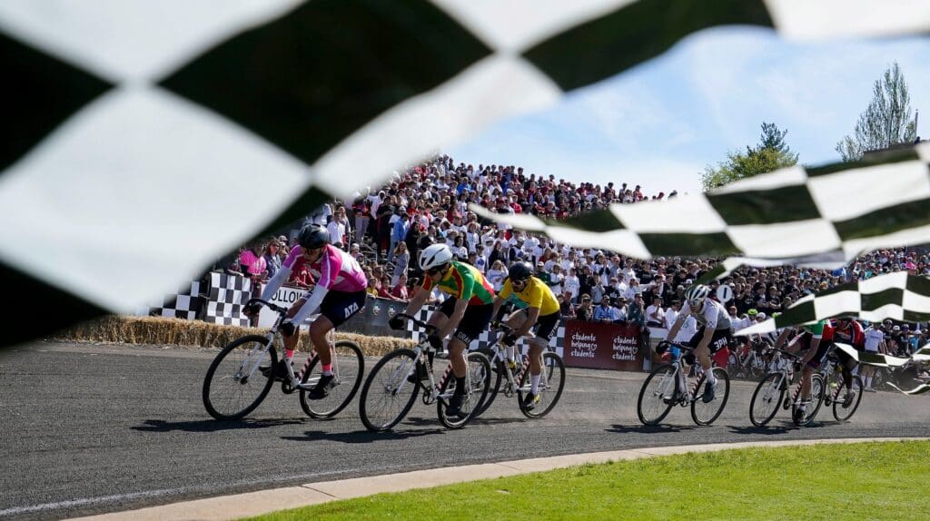Riders race into the first turn, on April 20, 2024, during the 73th annual men's Little 500 at Armstrong Stadium at Indiana University in Bloomington, IN.