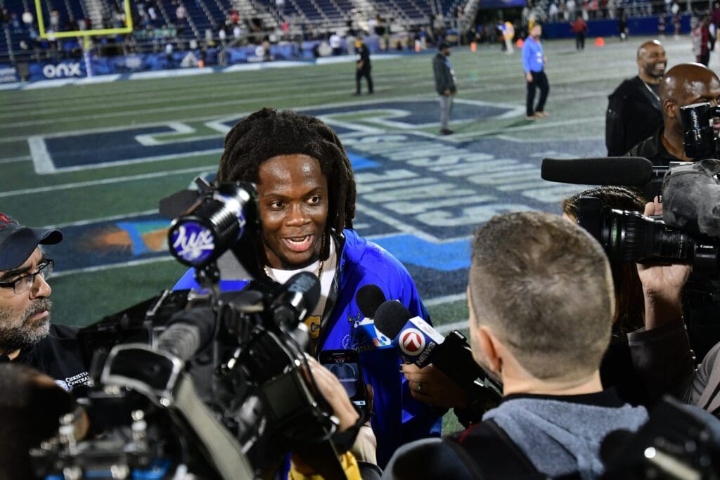 Miami Northwestern head coach Teddy Bridgewater talks to media following the team's win over Raines in the Class 3A state championship at Florida International University on Dec. 14, 2024.