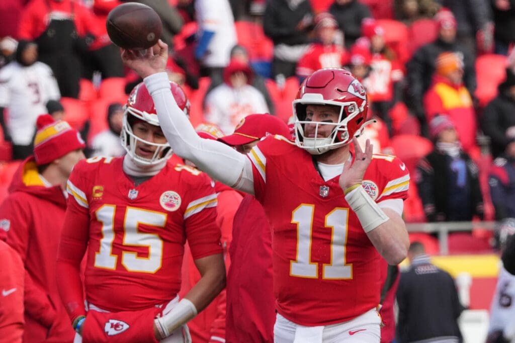 Jan 18, 2025; Kansas City, Missouri, USA; Kansas City Chiefs quarterback Carson Wentz (11) warms up before a 2025 AFC divisional round game against the Houston Texans at GEHA Field at Arrowhead Stadium. Mandatory Credit: Denny Medley-Imagn Images
