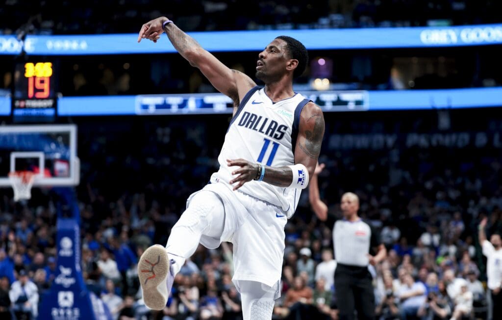 Feb 27, 2025; Dallas, Texas, USA; Dallas Mavericks guard Kyrie Irving (11) reacts after shooting against the Charlotte Hornets during the second half at American Airlines Center. Mandatory Credit: Kevin Jairaj-Imagn Images