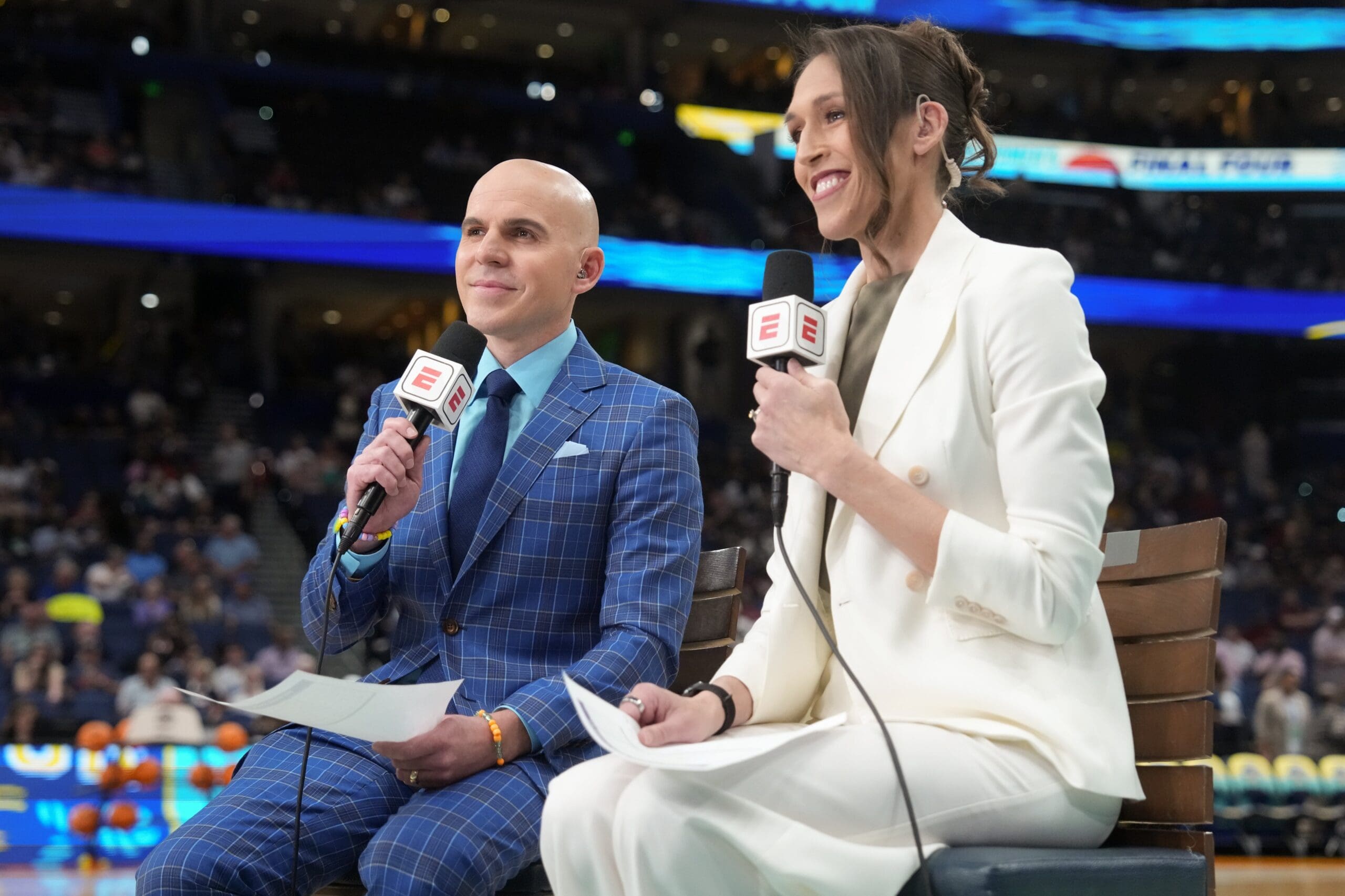 Apr 6, 2025; Tampa, FL, USA; ESPN announcers Ryan Ruocco and Rebecca Lobo look on before the national championship of the women's 2025 NCAA tournament between the South Carolina Gamecocks and the Connecticut Huskies at Amalie Arena. Mandatory Credit: Kirby Lee-Imagn Images